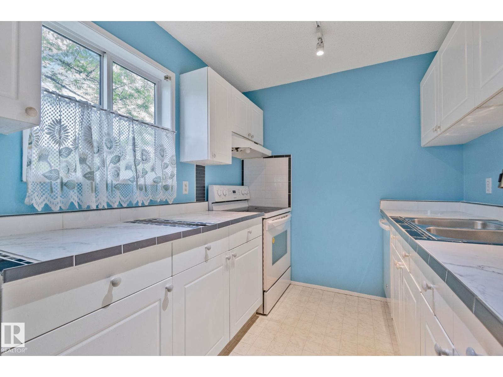 #318 17109 67 AV NW - 19