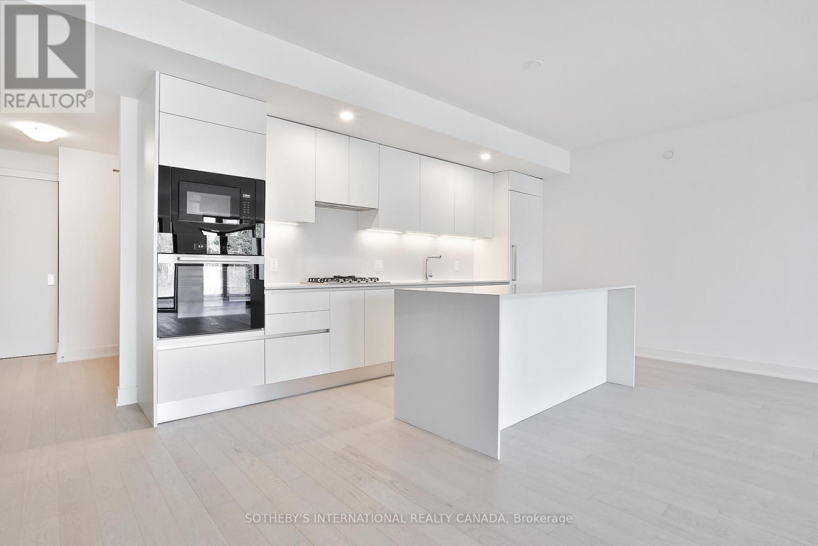 #311 200 KEEWATIN AVENUE - 4