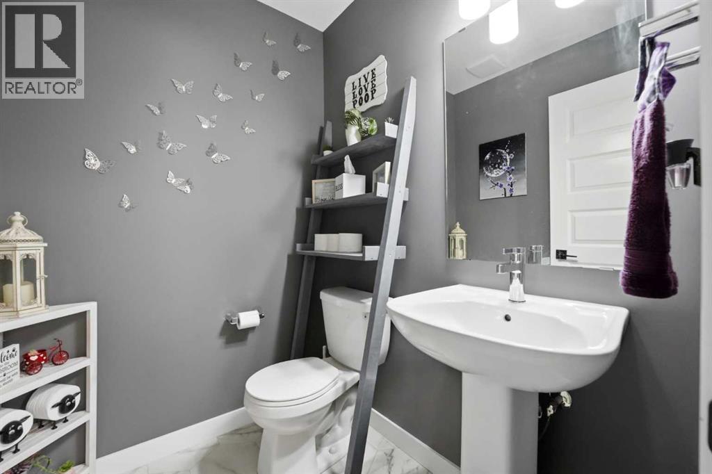 Main level two-piece bathroom