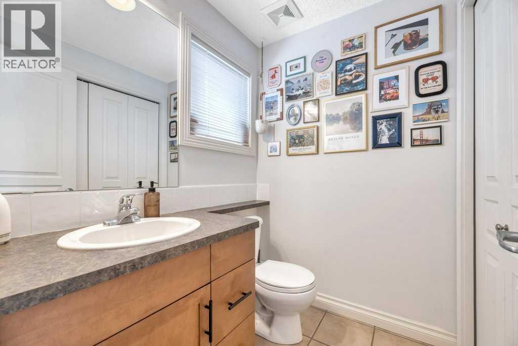 #13 148 Rockyledge View NW - 13