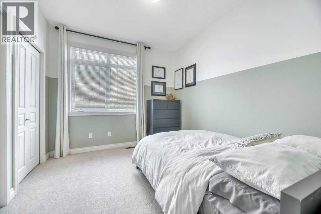 #13 148 Rockyledge View NW - 23