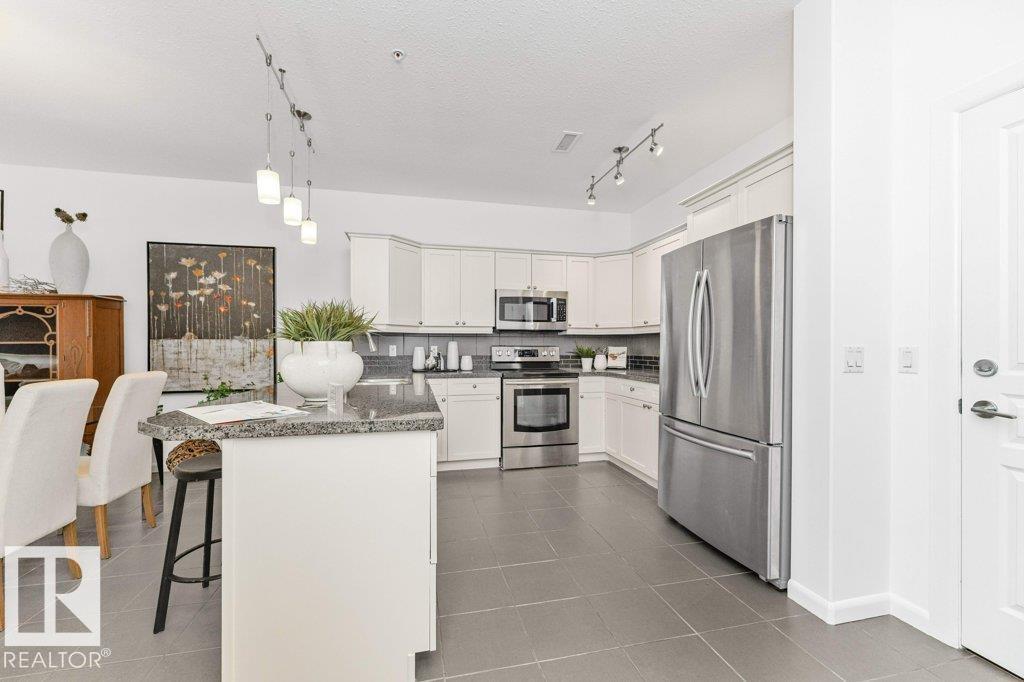 #302 160 MAGRATH RD NW - 15
