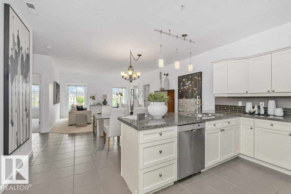 #302 160 MAGRATH RD NW - 13
