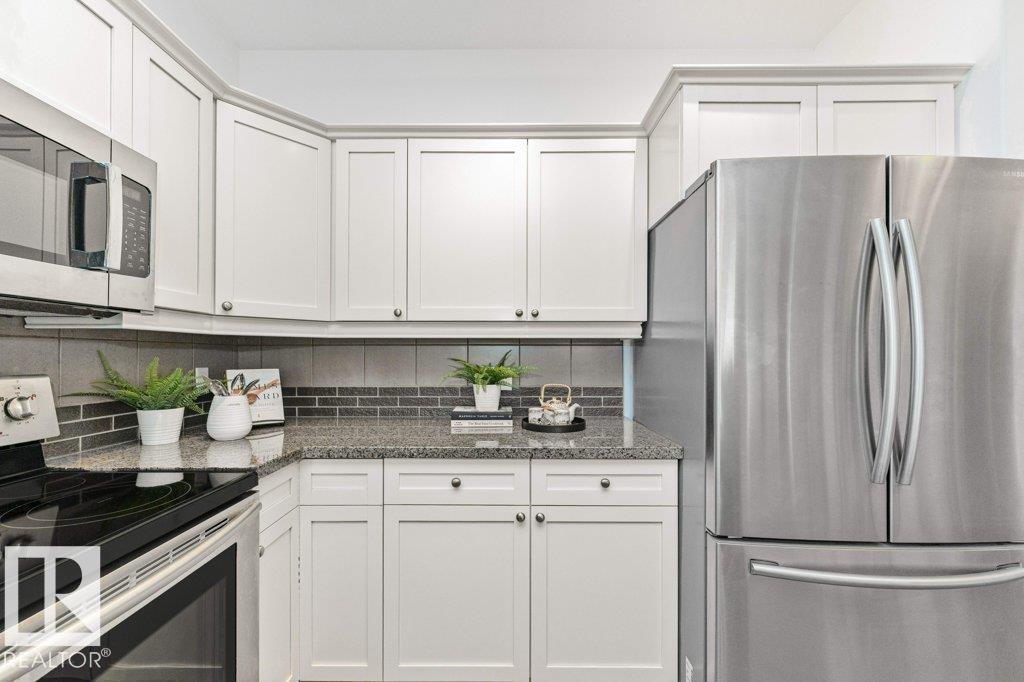 #302 160 MAGRATH RD NW - 19
