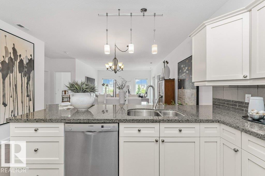 #302 160 MAGRATH RD NW - 14