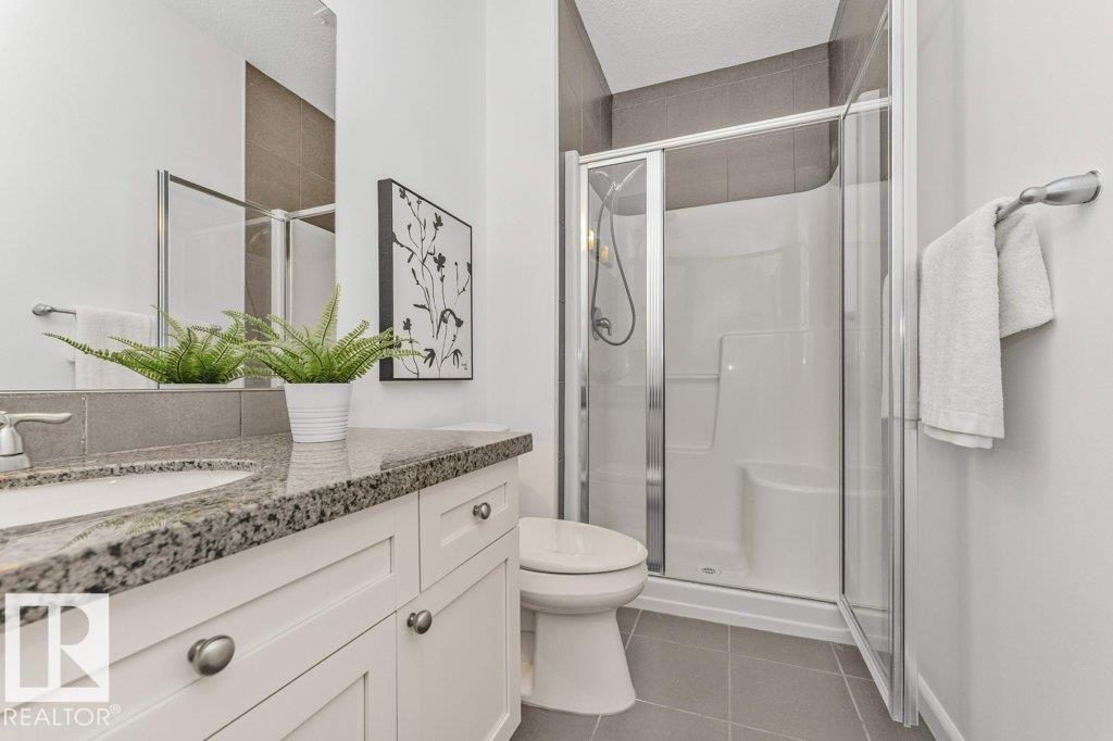 #302 160 MAGRATH RD NW - 32