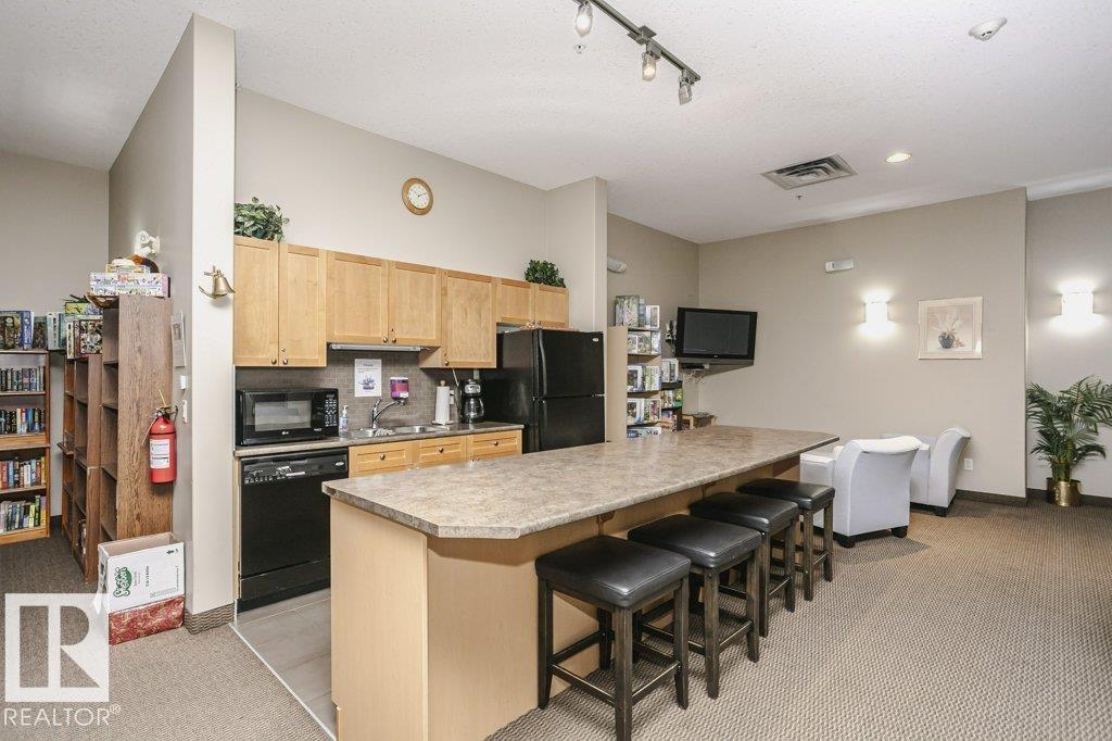#302 160 MAGRATH RD NW - 39
