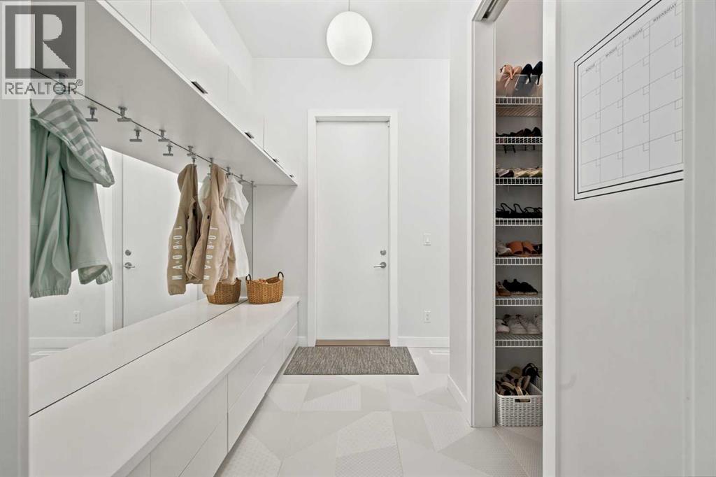 Mudroom with walk-in closet