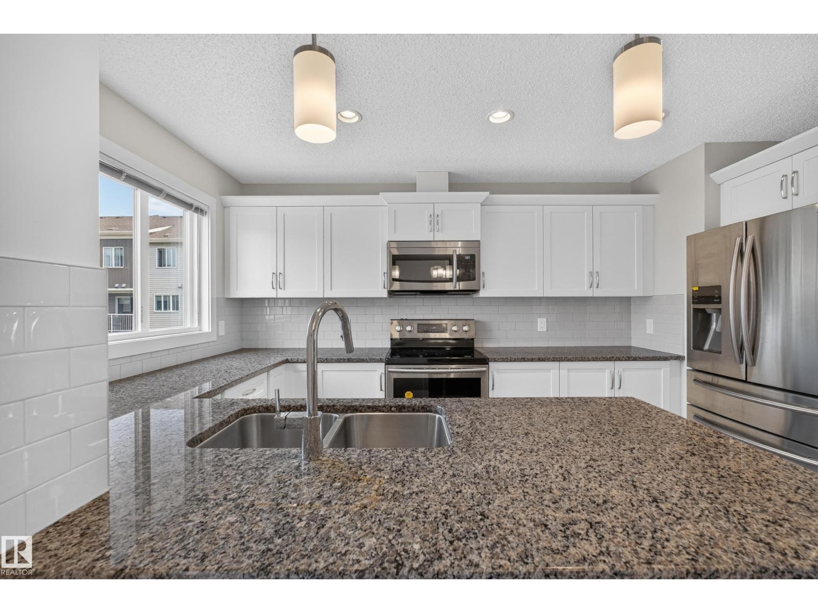 #34 2121 HADDOW DR NW — photo 12