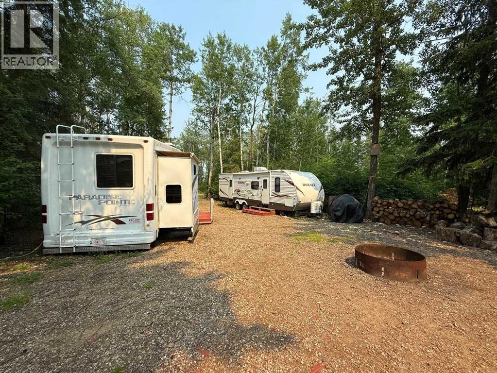 CAMPER AND FIREPIT AREA