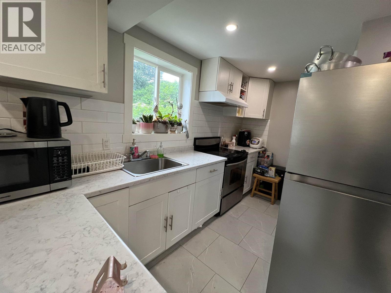 215 E 9TH AVENUE - 2