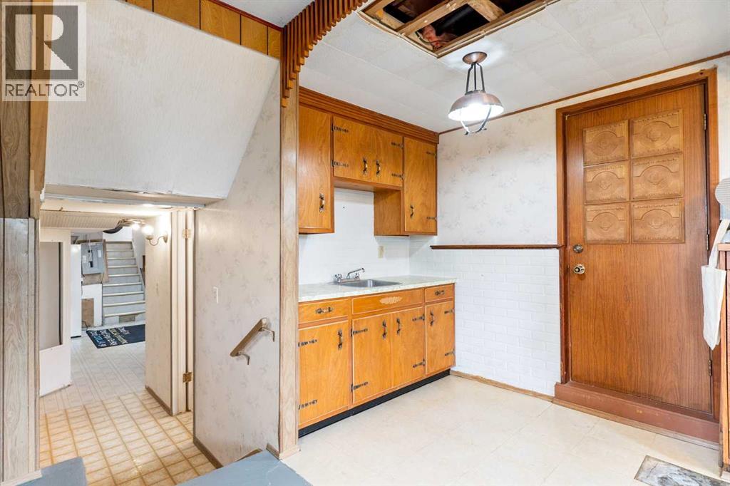 Lower level kitchenette and exit