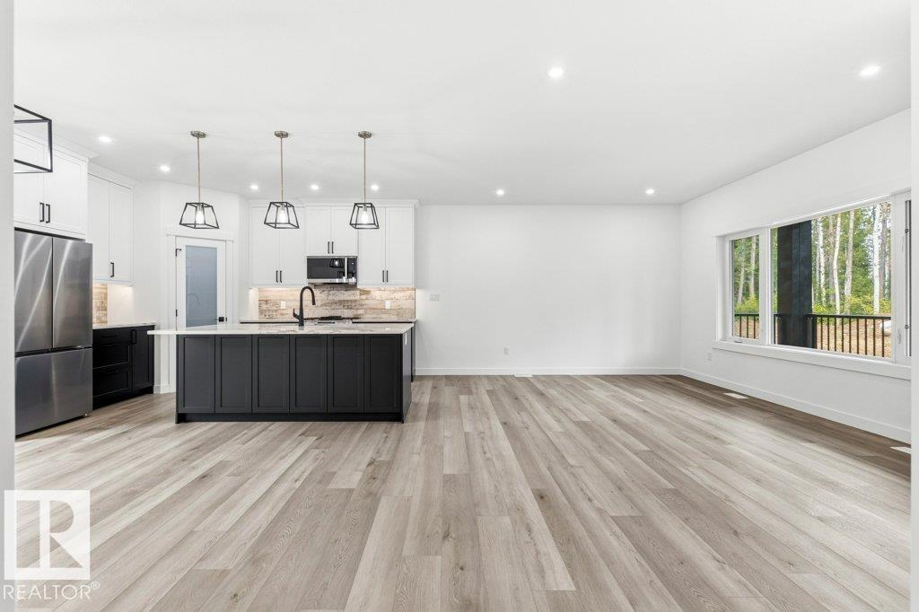 #100 54127 RGE ROAD 30 - 23