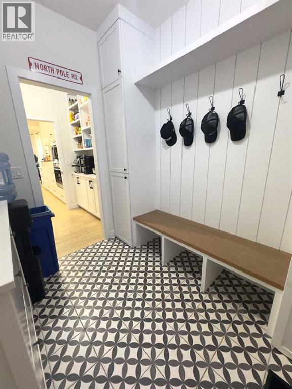 Bootroom into walk through pantry