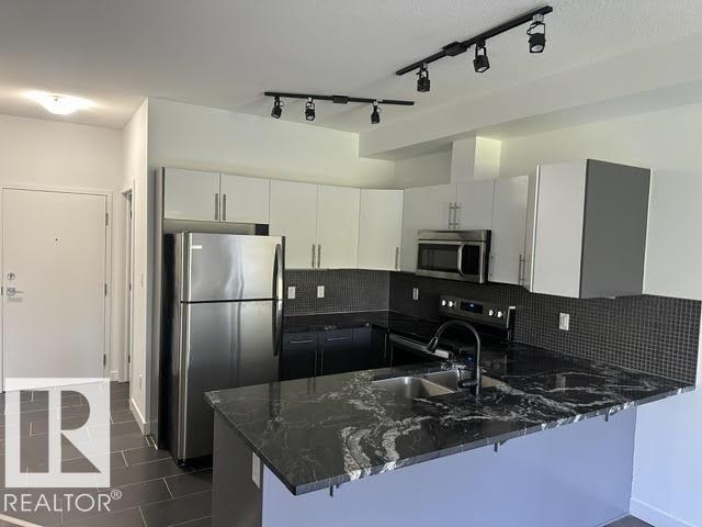 #402 10611 117 ST NW - 1