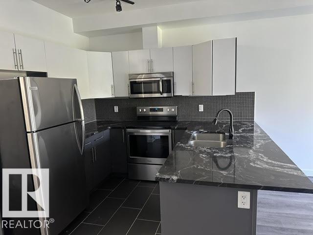 #402 10611 117 ST NW - 4