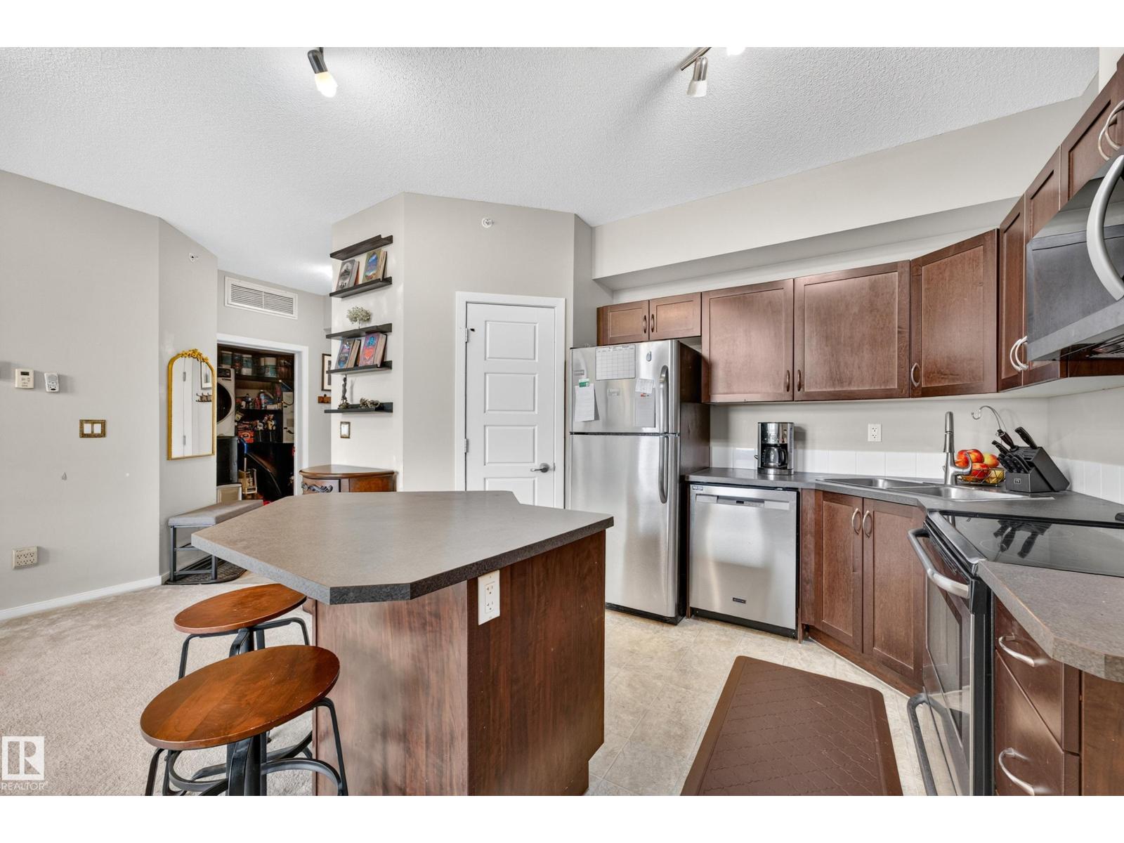 #417 13835 155 AV NW - 8