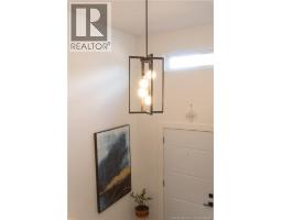 Living room - 30 Beau Domaine Court, Dieppe, NB E1A9H5 Photo 8