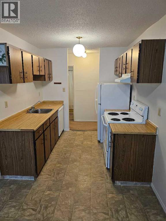 #317 5611 9 Avenue - 11