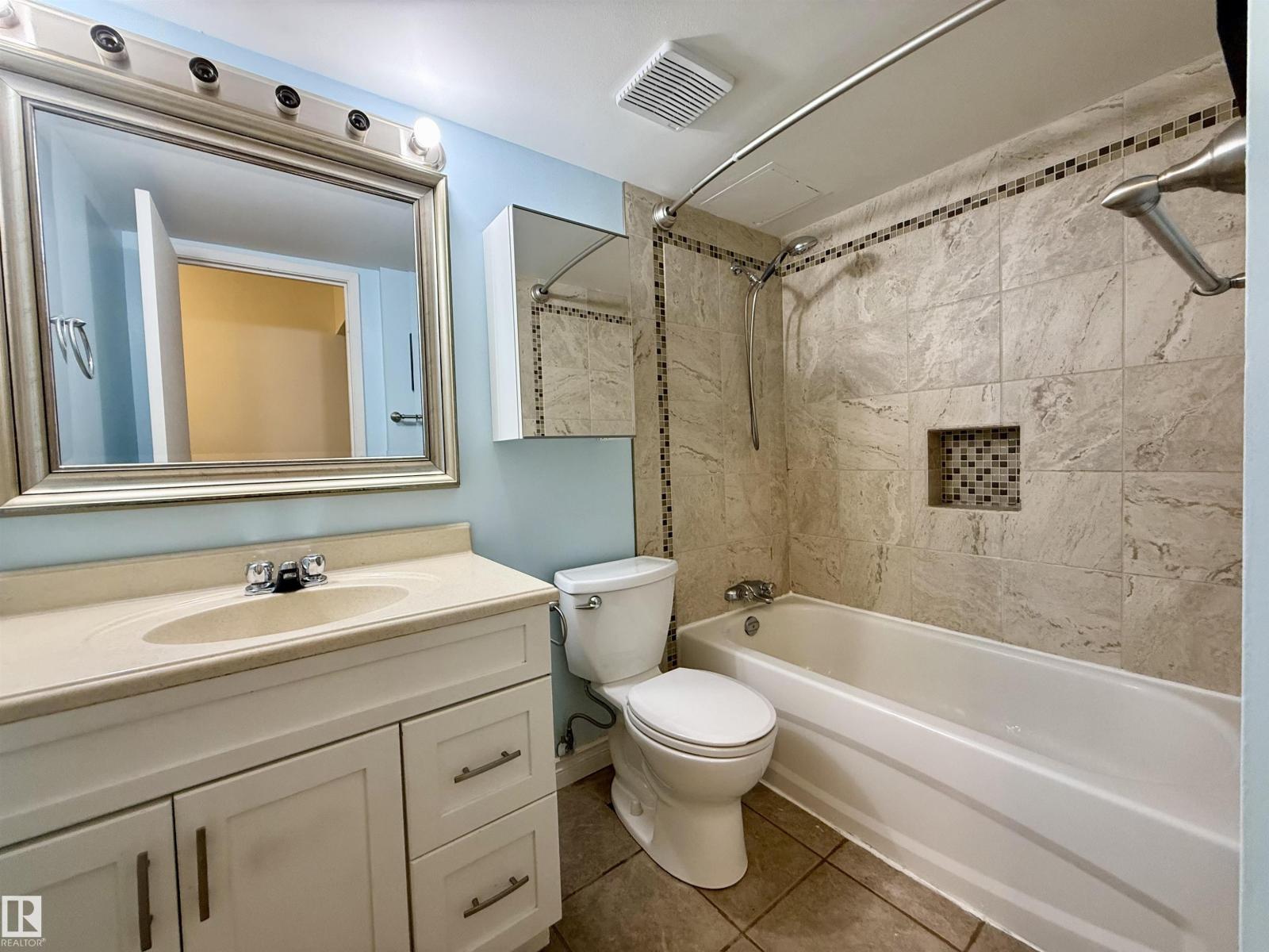 #409 10145 109 st NW - 17