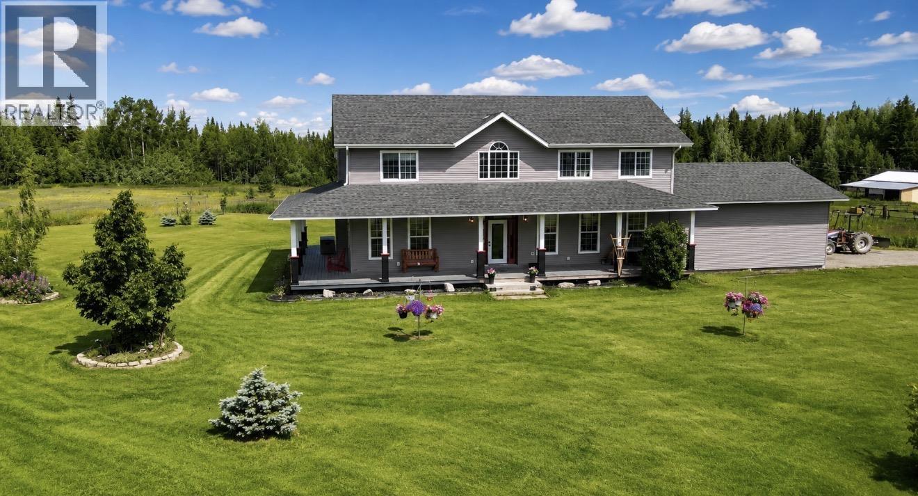 Front exterior of 5235 E RED ROCK ROAD · Prince George, BC