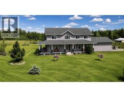 Front exterior of 5235 E RED ROCK ROAD · Prince George, BC