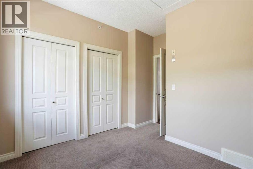 #11 148 Rockyledge View NW - 21