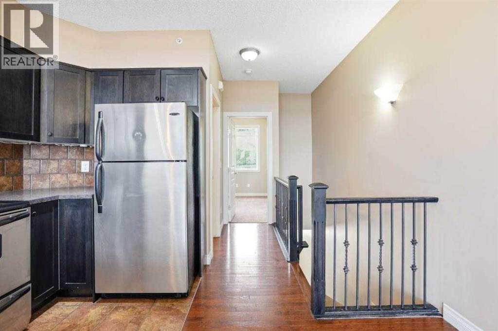 #11 148 Rockyledge View NW - 13