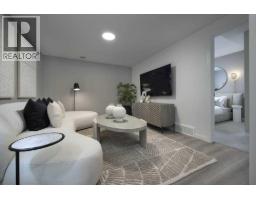 Living room - 29 Wolf Hollow Common Se, Calgary, AB T2X6C5 Photo 16