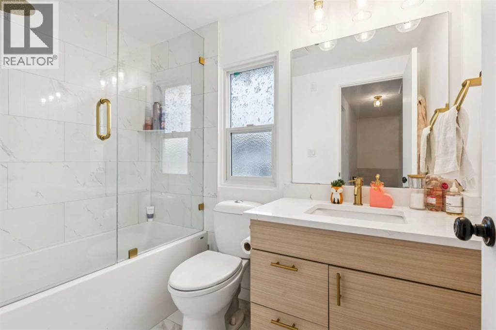 10719 Mapleglen Crescent SE — photo 32