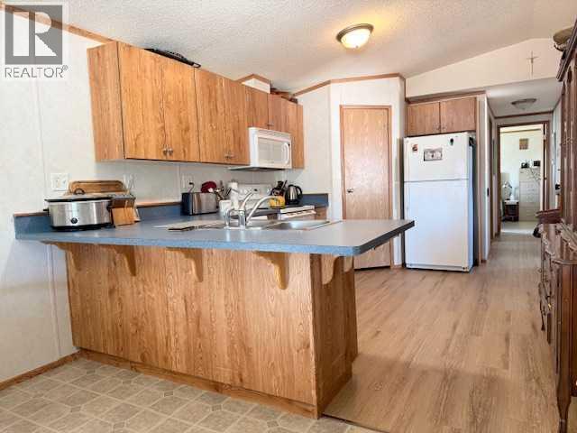 #101, 4819 51 Avenue - 11
