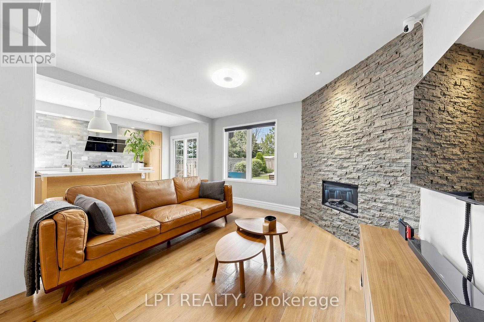Living Room and Fireplace combined with Kitchen