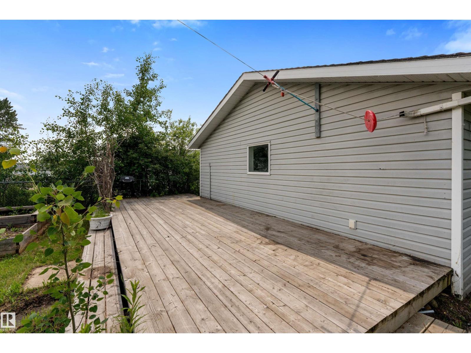 5212 46 ST - 57