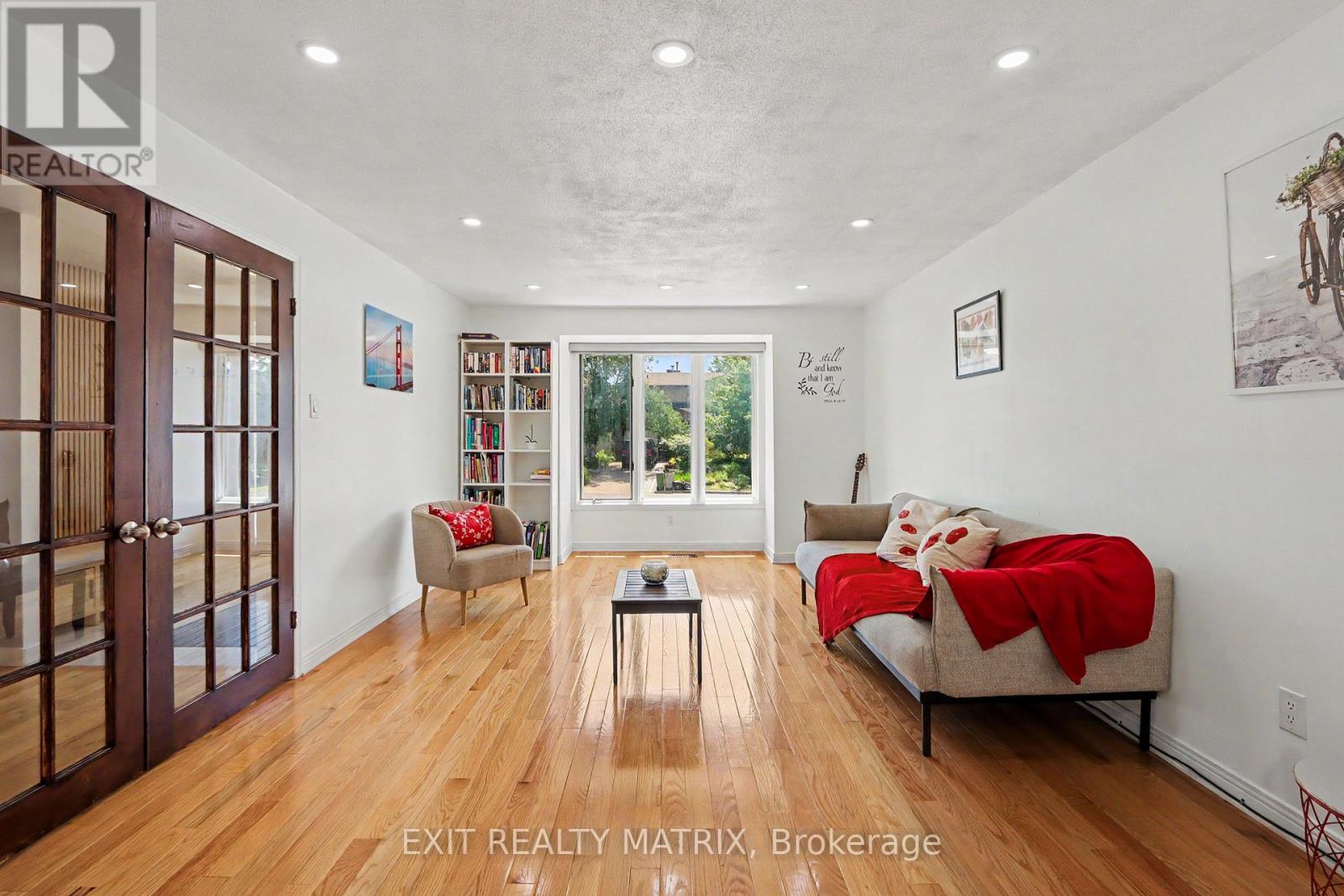 Bright living room with hardwood floors