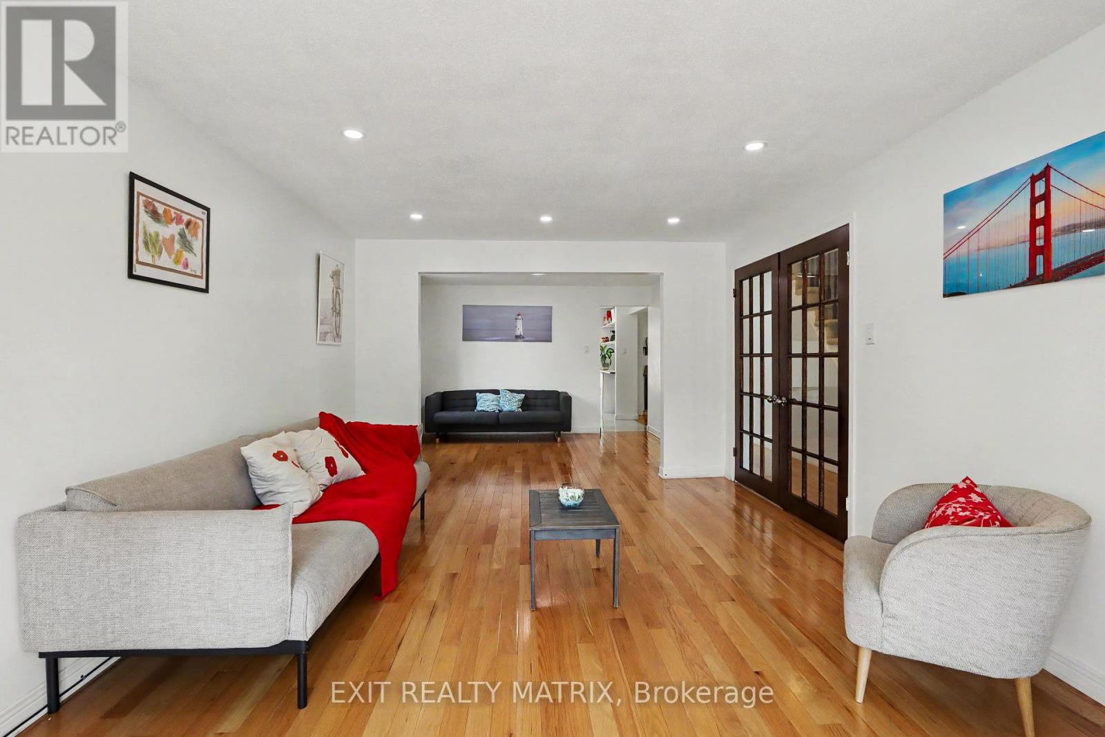 Bright living room with hardwood floors