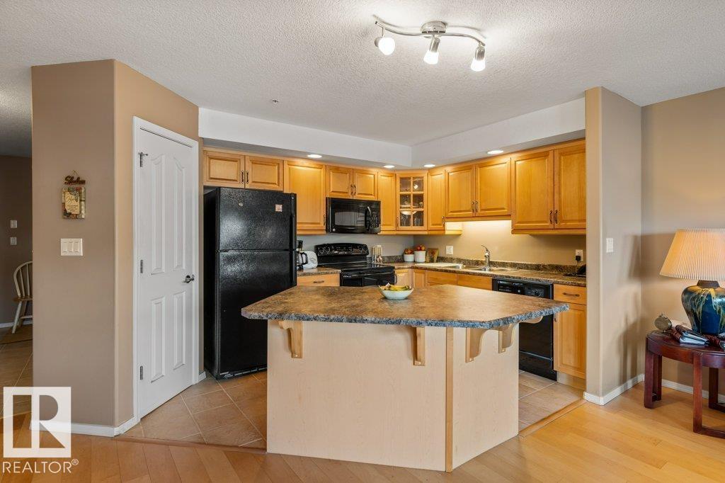 #105 1320 RUTHERFORD RD SW - 12