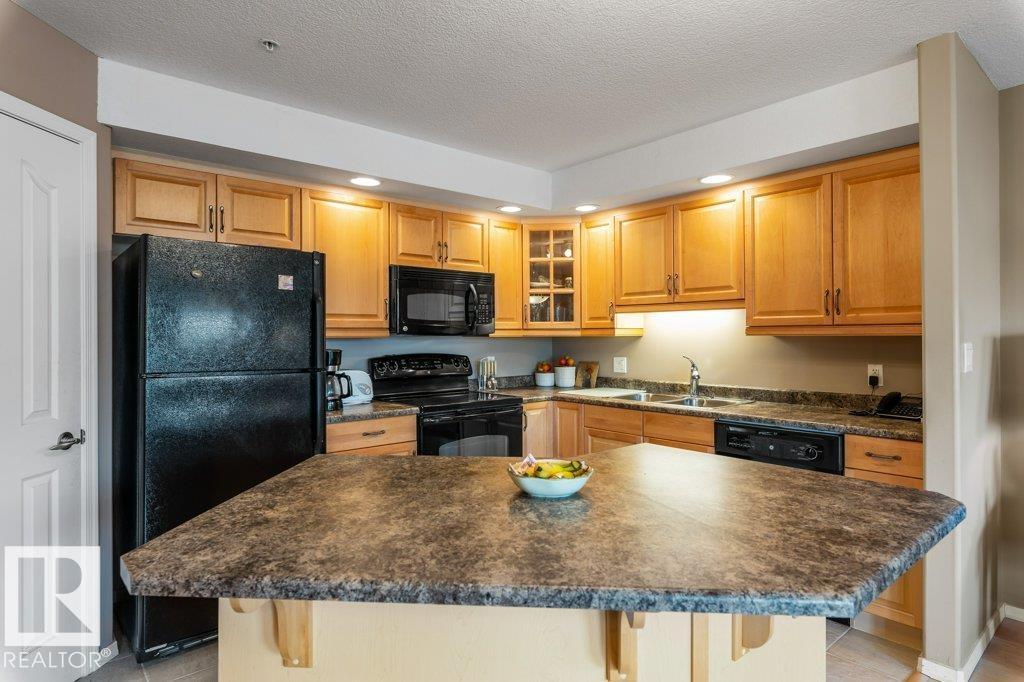 #105 1320 RUTHERFORD RD SW - 13
