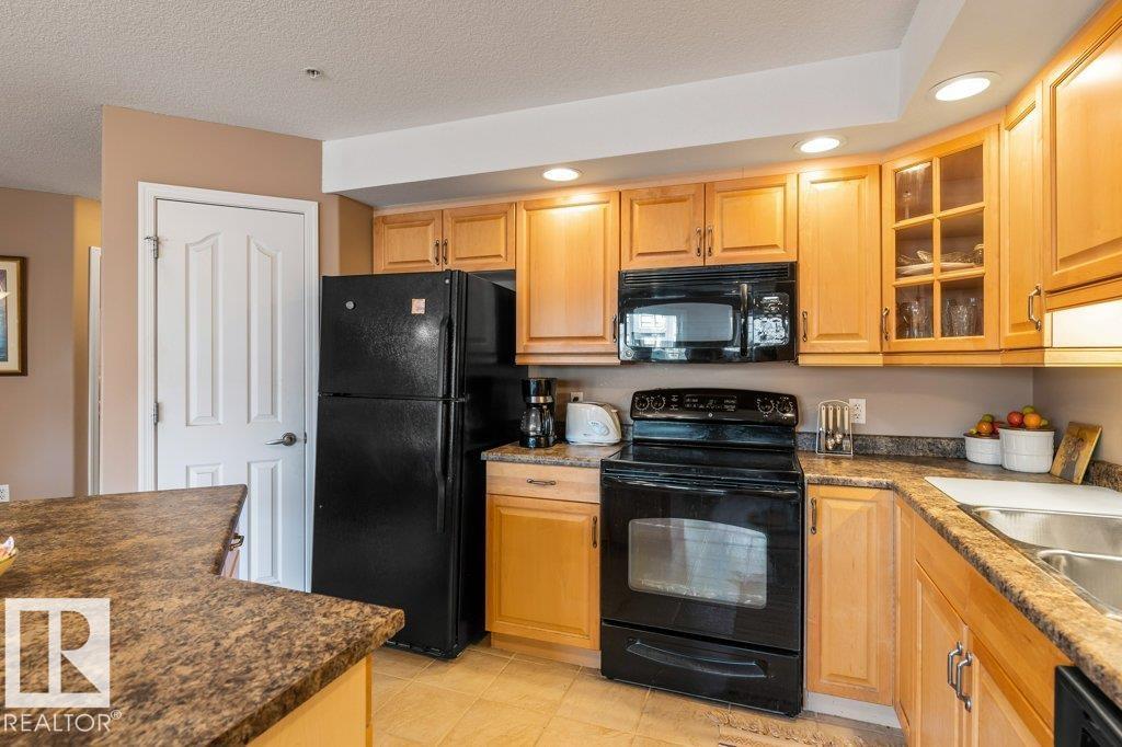 #105 1320 RUTHERFORD RD SW - 14