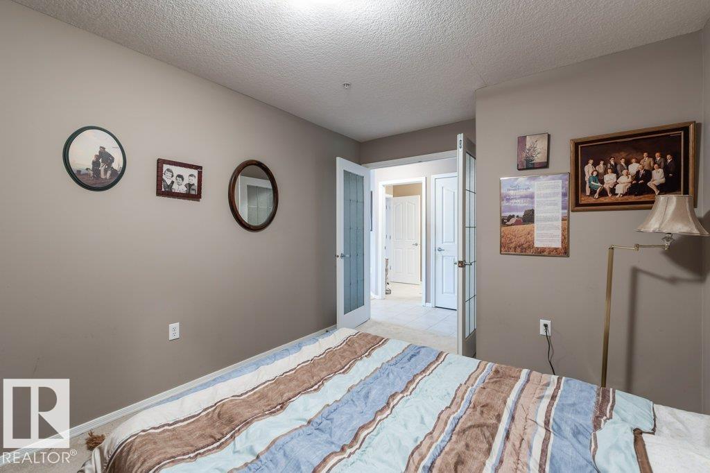 #105 1320 RUTHERFORD RD SW - 21