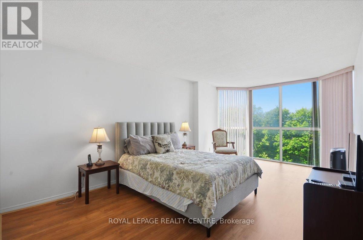 #410 1360 RATHBURN ROAD E - 22