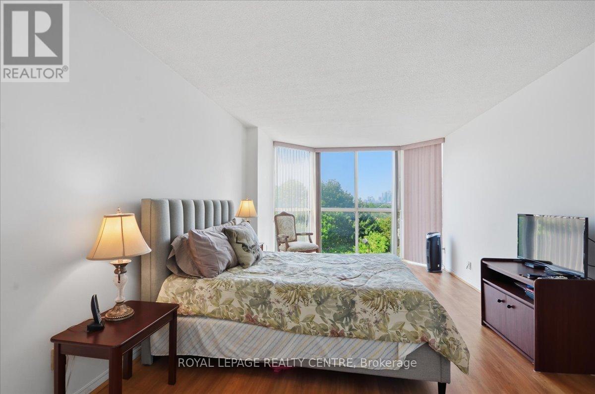 #410 1360 RATHBURN ROAD E - 23
