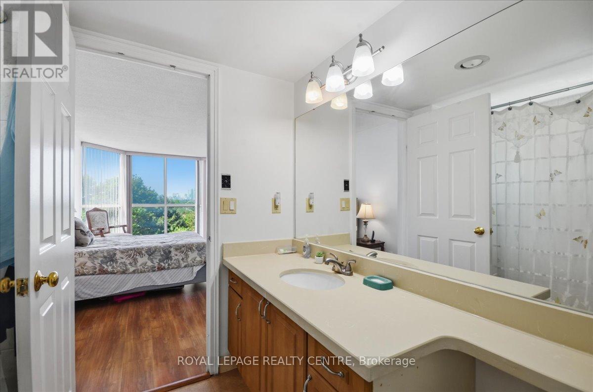 #410 1360 RATHBURN ROAD E - 25
