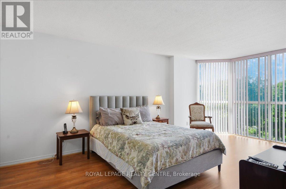 #410 1360 RATHBURN ROAD E - 18