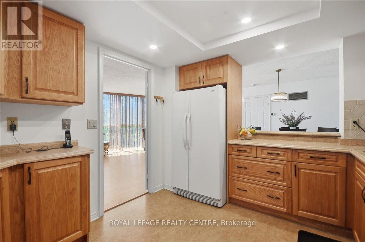 #410 1360 RATHBURN ROAD E - 14