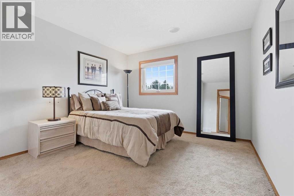 BEDROOM #2 - generously sized with a fantastic double closet - overlooks the front street