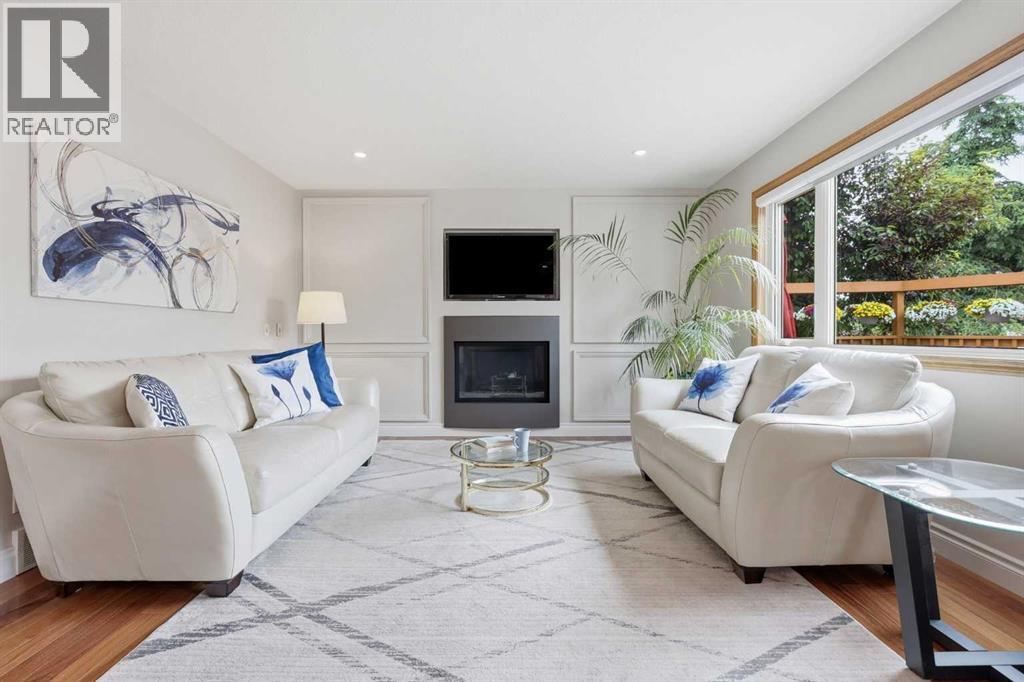 VIEW OF GREAT ROOM  - this is a huge room that will easily accommodate any set up for sectionals and or chairs and sofas.  A beautiful view of your deck and yard from here