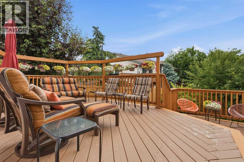REAR DECK  - top tier boasts an expansive entertaining area and features a matching framework to showcase hanging baskets (each with their own dribbler system)