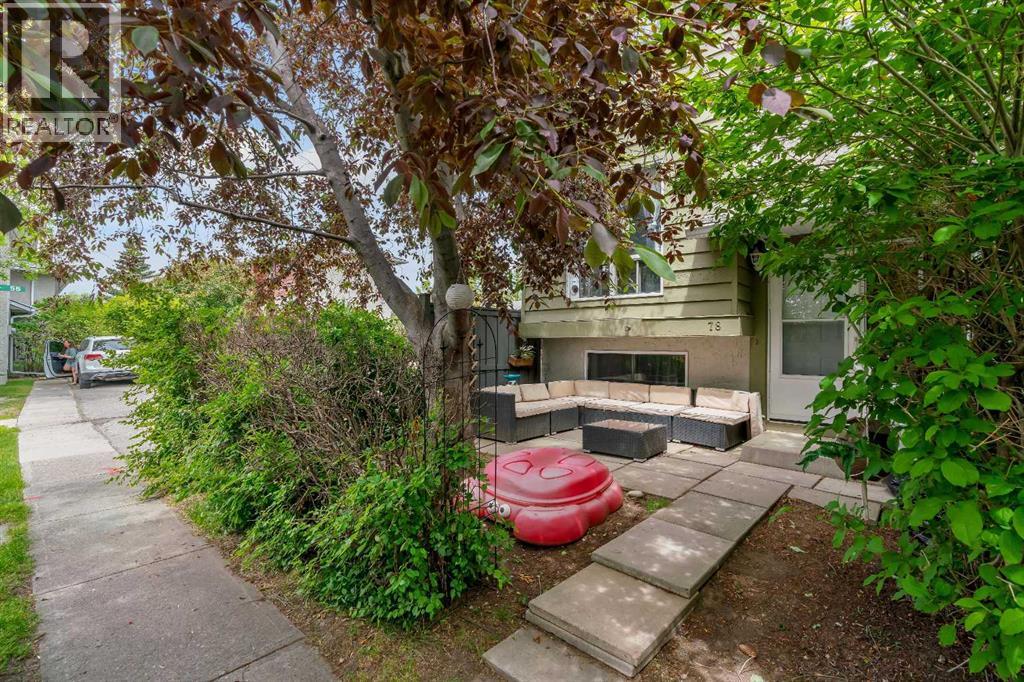 The back door has a secluded patio