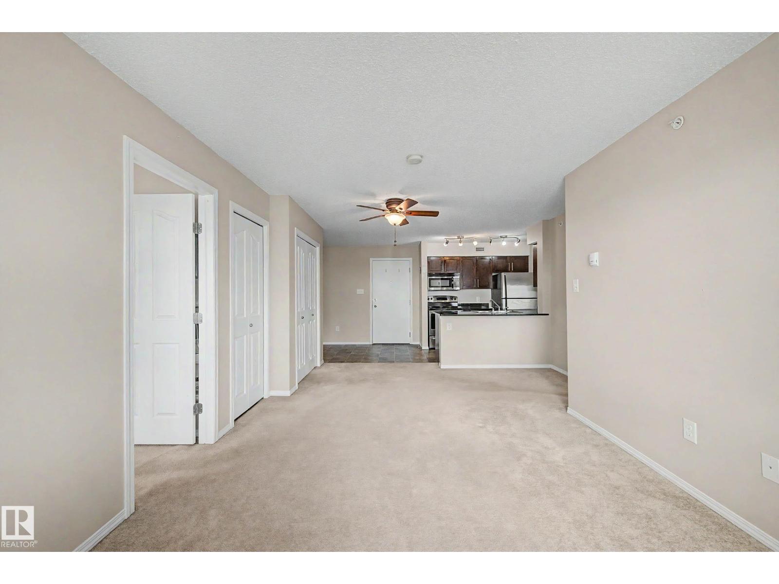 #404 1080 MCCONACHIE BV NW - 18