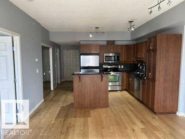 #710 10303 111 ST NW - 15